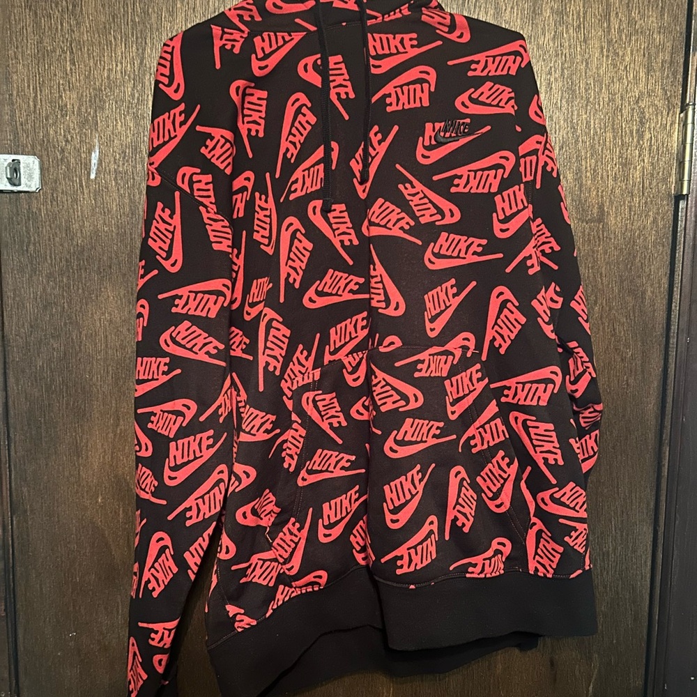 Nike Black Hoodie with Red Logo Pattern